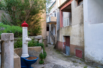 KRK Island, Vrbnik, Croatia - April 19, 2025: Cityscape. View of historic property