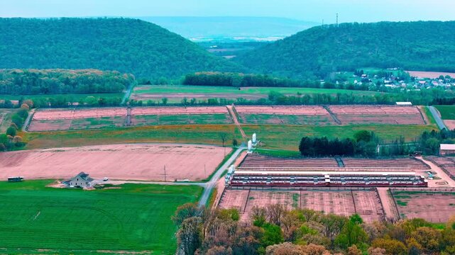 Aerial landscape of corn and guinea fowl poultry farm rural Appalachia Central Pennsylvania