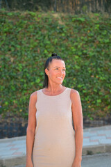 Portrait of a beautiful middle aged Scandinavian woman smiling and looking away