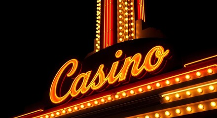 Brightly lit neon casino sign glowing at night against a dark sky
