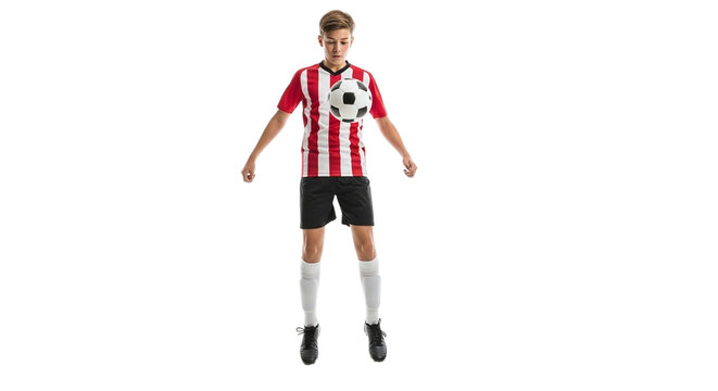 Young soccer player in red and white striped jersey controlling ball with chest isolated on transparent background, showcasing skill and agility - Powered by Adobe