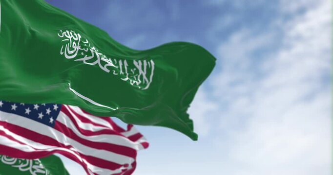 Saudi Arabian and American flags waving together in sky, 3D render