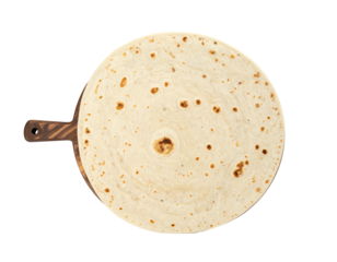 Round tortilla on a wooden board