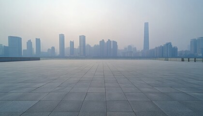 Empty plaza overlooking a hazy cityscape with modern skyscrapers