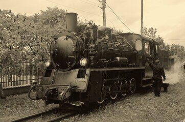 old steam locomotive in sepia