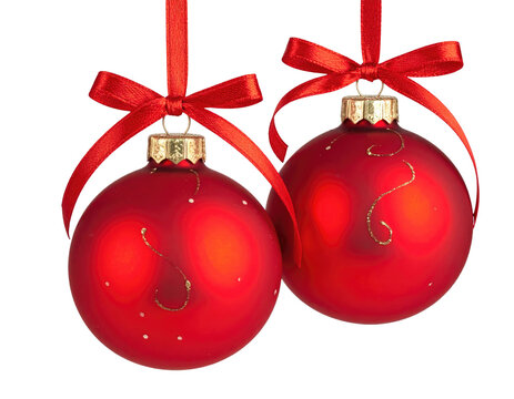Two red Christmas ornaments hanging