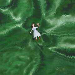 girl lying on the grass