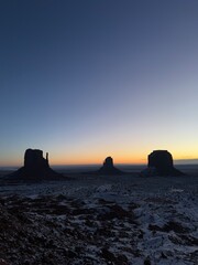 Snow-covered Monument valley at sunrise.