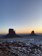Snow-covered Monument valley at sunrise.