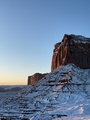 Snow-covered Monument valley at sunrise.