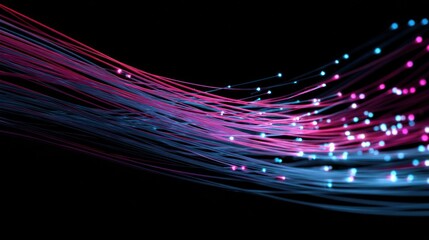 Abstract image of flowing, luminous strands in pink, blue, and purple hues against a black background, interspersed with glowing dots