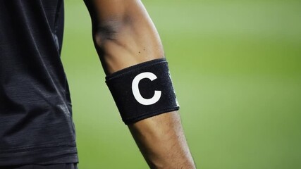 Captain's armband of a soccer player. - Powered by Adobe