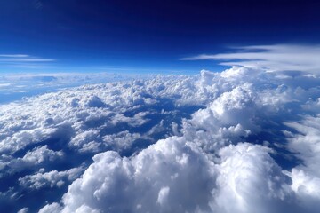 Naklejka premium Clouds and blue sky above the horizon during daylight from an airplane view point