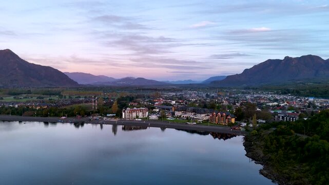 4K Aerial Drone Footage of a Lakeside Town during Golden Hour