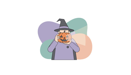 Person in witch hat holding jackolantern celebrating Halloween festivities