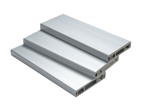Three stacked, light gray, composite decking boards