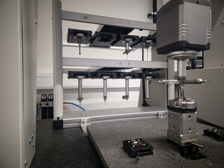 Advanced precision equipment working in a lab setting for 3D printing and manufacturing processes