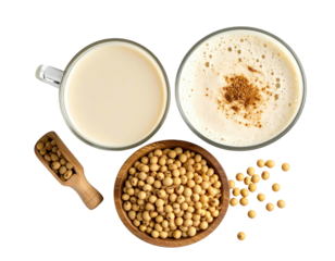 Two cups of milk, one plain and one spiced, with soybeans