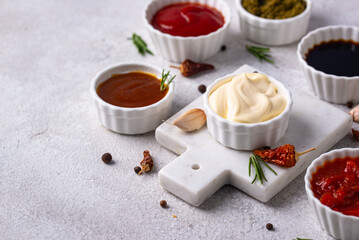 Set of different sauces. Ketchup, mustard, pesto
