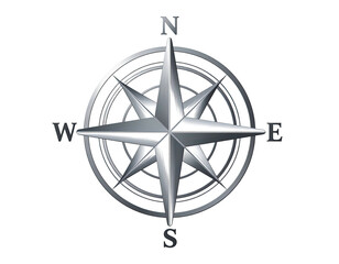 Metallic compass rose on black background