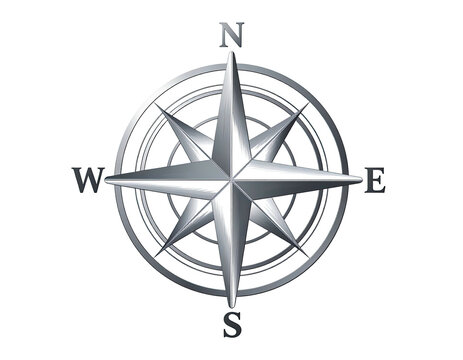 Metallic compass rose on black background