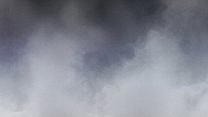 Dramatic gray gradient background resembling storm clouds and fog texture.