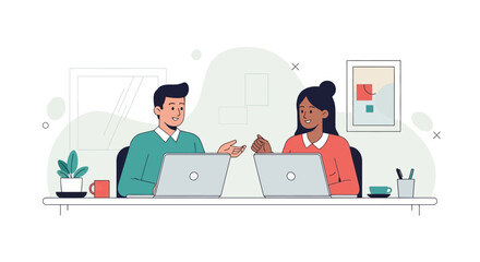 Two people working together at a desk with laptops in an office.