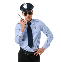 Young policeman in uniform with walkie talkie on white background