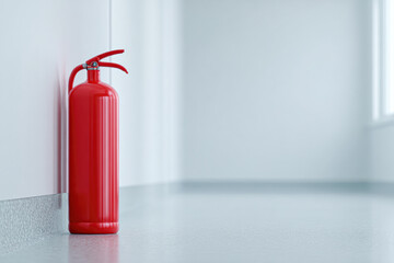 Obraz premium A bright red fire extinguisher stands against a white wall in a minimalist interior, highlighting safety equipment in a modern environment.
