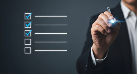 Businessman Checking Off Items on a Digital Checklist