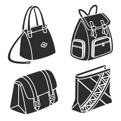 Four black silhouette vector designs of bags handbag