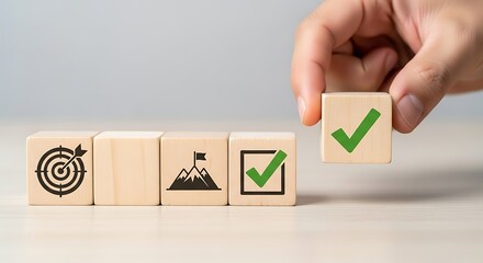 Achieving Goals: Hand Placing Wooden Block with Check Mark Symbol, Representing Success, Objectives, and Project Completion with Vision.