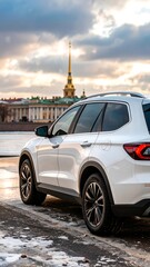 White SUV parked outdoors, scenic city backdrop