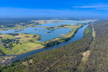 Drone aerial photograph of the Nepean River and large water reservoirs in the Cumberland Plain region of Hawkesbury Heights looking towards Penrith in NSW, Australia.