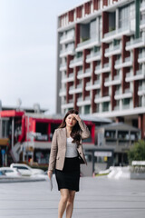 Fototapeta premium Confident Businesswoman Walking in City