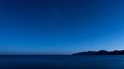 Night sea under starry sky