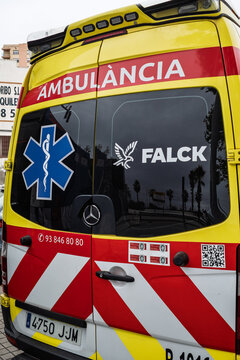 Barcelona, Spain-October 5, 2025. A close-up of the rear of a yellow and red ambulance in Catalonia, Spain, with "Ambul&agrave;ncia" written in Catalan