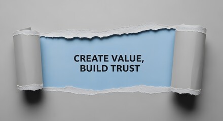 Inspiring message to create value and build trust revealed through torn paper, a concept for teamwork, business integrity, and customer relationships