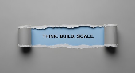 Empowering business growth, showing "Think Build Scale" message through torn paper, inspiring innovation and success in a modern and dynamic way