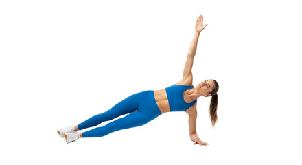 Dynamic Young Woman in Blue Sportswear Doing Side Plank Exercise Showing Strength and Focus