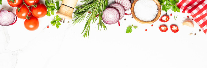 Spices, herbs, olive oil and fresh tomatoes.