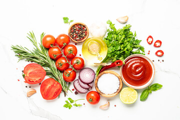 Food background, cooking ingredients on white marble table.
