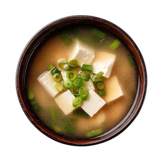 Top view of Japanese miso soup with tofu cubes and green onions in dark bowl with reddish rim, savory and nutritious