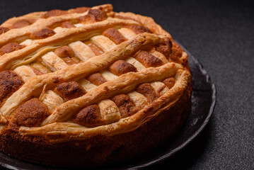 Sweet American pie with apples, pears, and cinnamon, a homemade dessert. Apple American pie