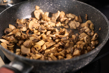 The kitchen is warm and inviting, perfect for meal preparation or cooking experimentation.