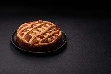 Sweet American pie with apples, pears, and cinnamon, a homemade dessert. Apple American pie