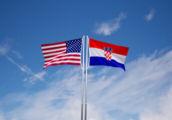 flags of  croatia and United States of America over blue sky background.
