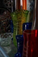 various porcelain and glassware sold at a flea market
