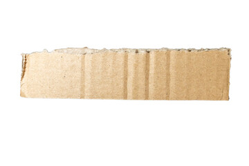 Close-up view of a piece of corrugated cardboard, showcasing its texture and natural brown color. Ideal for crafting, packaging designs, or as a background in various projects.