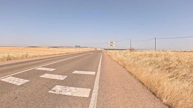 EX-346 paved road between La Haba and Don Benito, province of Badajoz, Extremadura, Spain